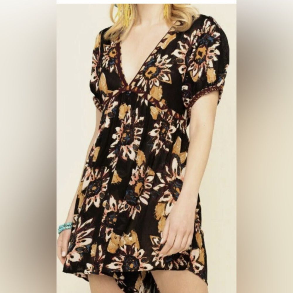 Free People Black on the Edge Floral boho romper. Festival, flowy. Hippie. Sz M